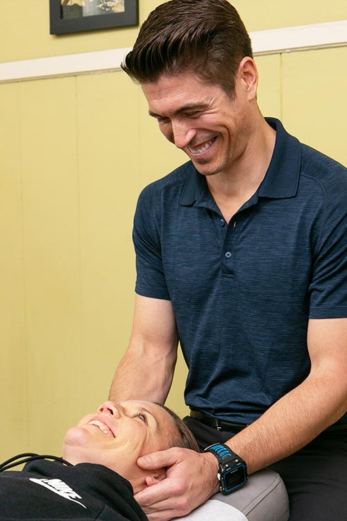 Chiropractor San Francisco CA Dr. Nick Cruz Neck Exam Chiropractor San Francisco CA Dr. Nick Cruz Neck Exam